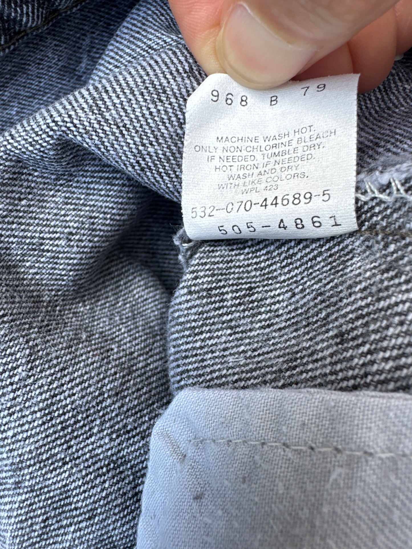 Vintage Levi’s 505 (1990) Black Acid Washed Jeans Made in USA Size 33x34